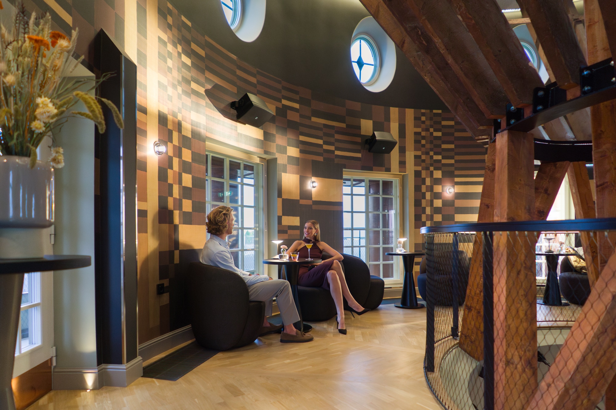 Elevate your evening above the rooftops of Helsinki at Kupoli cocktail bar and stay with a style at NH Collection Helsinki Grand Hansa.